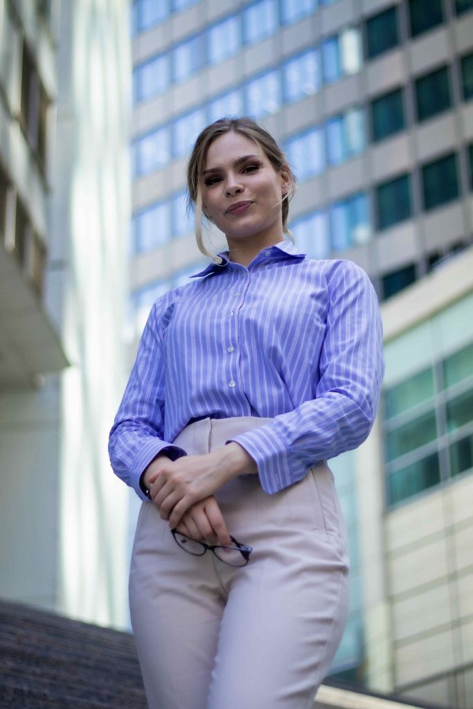 Frankfurt business district portrait of a woman in a striped shirt